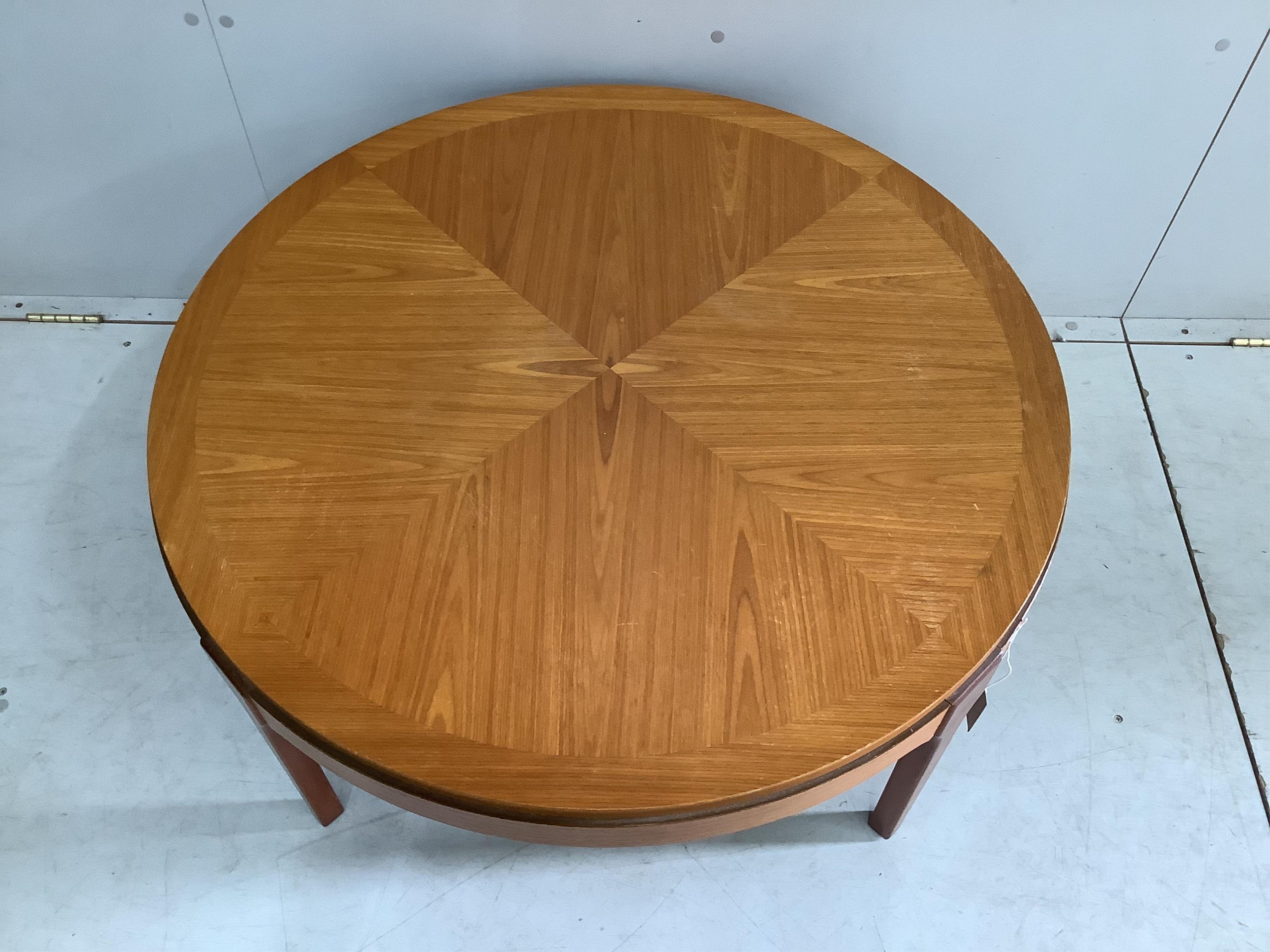 A mid century circular teak coffee table, diameter 87cm, height 41cm
